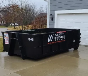 10 yard dumpster on a driveway