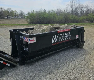 Wright Dumpster Rental dumpster with concrete debris